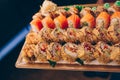 Large set of Sushi Rolls Warm Ebi Sake Unagi Spring. A lot assortment Philadelphia roll Dishes from Japanese raw fish  in one Royalty Free Stock Photo