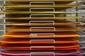 Large sheets of colored paper of warm colors