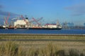 Large ship with cranes in the port of Rotterdam, Netherlands