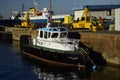 A large ship and fishing boats at the pier in the port of Valparaiso. Chili