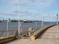 large ship leaving Liverpool sailing down the river Mersey Royalty Free Stock Photo