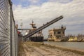 A large ship passes a drawbridge on Welland Canal in Ontario.