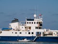 Large ship and tender boat