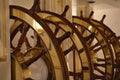 Large ships wheel at the helm of a sailing ship.