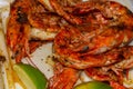 Large shrimp red royal roasted grilled seasoned tasty slice of lime