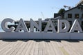 The large sign of Canada is on the dock in Halifax.