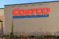 Large sign of Costco Wholesale on side of metal warehouse wall