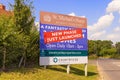 Large sign promoting new build homes at a housing development. UK