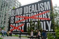 Large sign on side of building on High Line in New York City