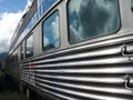 A large silver passenger train