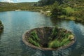 Large sinkhole in a dam lake on the highlands Royalty Free Stock Photo