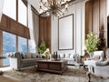 Large sitting area with high ceilings and American style wood paneling on the walls and a large window to the ceiling
