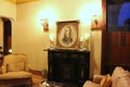 Sitting room with comfy chairs and portrait of historic figure, The Belva Lockwood Inn, Owego, New York, 2018