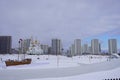 A large skating rink with a wooden boat, an Orthodox church in the distance. Royalty Free Stock Photo