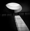 Large skylight flooding light into underground carpark