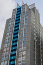 Large skyscraper full of apartments with balcony`s exterior architecture background Royalty Free Stock Photo