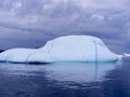 Large smooth iceberg with cracks running across surface in Twillingate Harbour Royalty Free Stock Photo