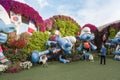 Large Smurfs dolls in clothes of national football teams from World Cup in botanical Dubai Miracle Garden in Dubai city, United