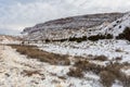 Large snow covered mountain with brush covered field in rural New Mexico Royalty Free Stock Photo