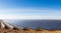 Large Solar Panel Array Under Blue Sky Royalty Free Stock Photo