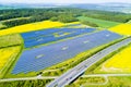 Aerial view of solar power plant near highway