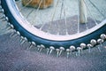 Large spikes on the wheels of bike for Speedway