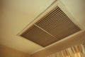 Large square return air vent located in the ceiling of a home. Royalty Free Stock Photo