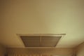 Large square return air vent located in the ceiling of a home. Royalty Free Stock Photo