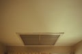 Large square return air vent located in the ceiling of a home.