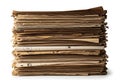 A large stack of aged and weathered vintage paper documents piled neatly against a pure white background for office concepts Royalty Free Stock Photo
