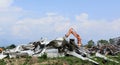 Large stack of aluminum and ferrous materials scrap in the recycling center.