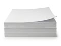 A large stack of blank white paper sheets neatly organized on a table Royalty Free Stock Photo