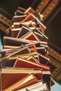 Large stack of books at a museum