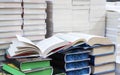 stack of books, close up. Open book on the table in library. Back to school concept. Royalty Free Stock Photo