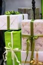 Large stack of Christmas presents. many of packaged boxes with gifts in green, beige and gold color tones. christmas Royalty Free Stock Photo