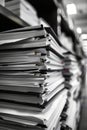 Large Stack of Documents and Folders in Office Storage Room with Shallow Depth of Field Royalty Free Stock Photo