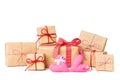 Large Stack of Gift box wrapped in recycled paper with ribbon bow, hearts and christmas ornament