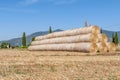 A large stack of hay bales in the Tuscan countryside scorched by the summer sun, Bientina, Pisa, Italy Royalty Free Stock Photo