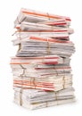 A large stack of white magazines