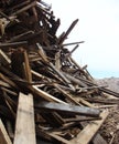 Large stack of wood on a demolition site Royalty Free Stock Photo