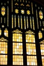 A large stained glass window inside a church