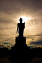 Large standing Buddha image shadows