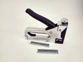 Large stapler and staples for construction work Royalty Free Stock Photo