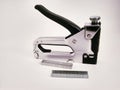 Large stapler and staples for construction work Royalty Free Stock Photo