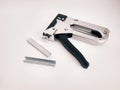 Large stapler and staples for construction work Royalty Free Stock Photo