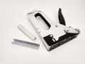Large stapler and staples for construction work Royalty Free Stock Photo