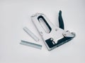 Large stapler and staples for construction work Royalty Free Stock Photo