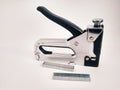 Large stapler and staples for construction work Royalty Free Stock Photo
