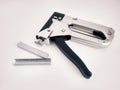 Large stapler and staples for construction work Royalty Free Stock Photo
