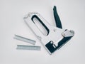 Large stapler and staples for construction work Royalty Free Stock Photo